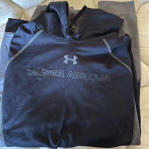 Black and grey men’s under armour heat gear hoodie.